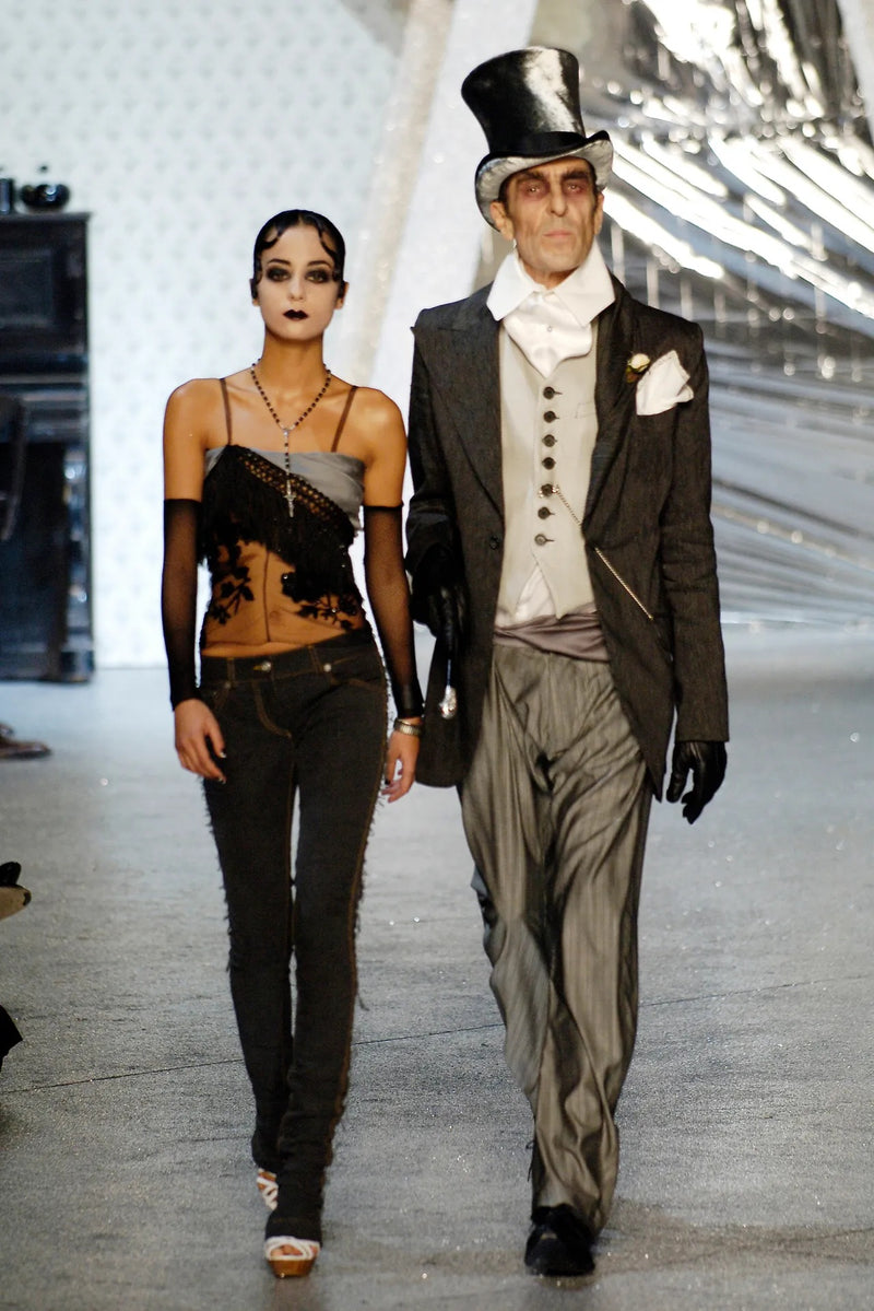 Model in John Galliano denim jacket with tulle detailing from Spring 2006 collection