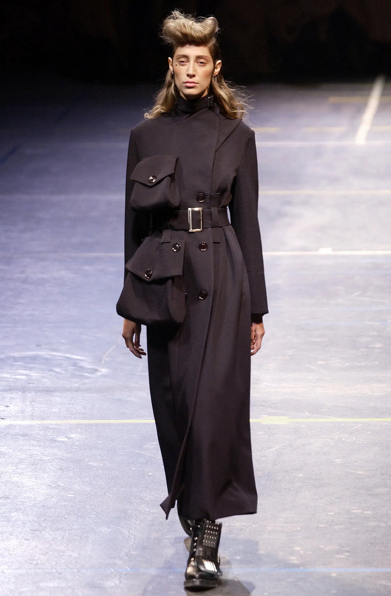 Black wool jacket by Yohji Yamamoto, Fall 2004 runway look with structured silhouette