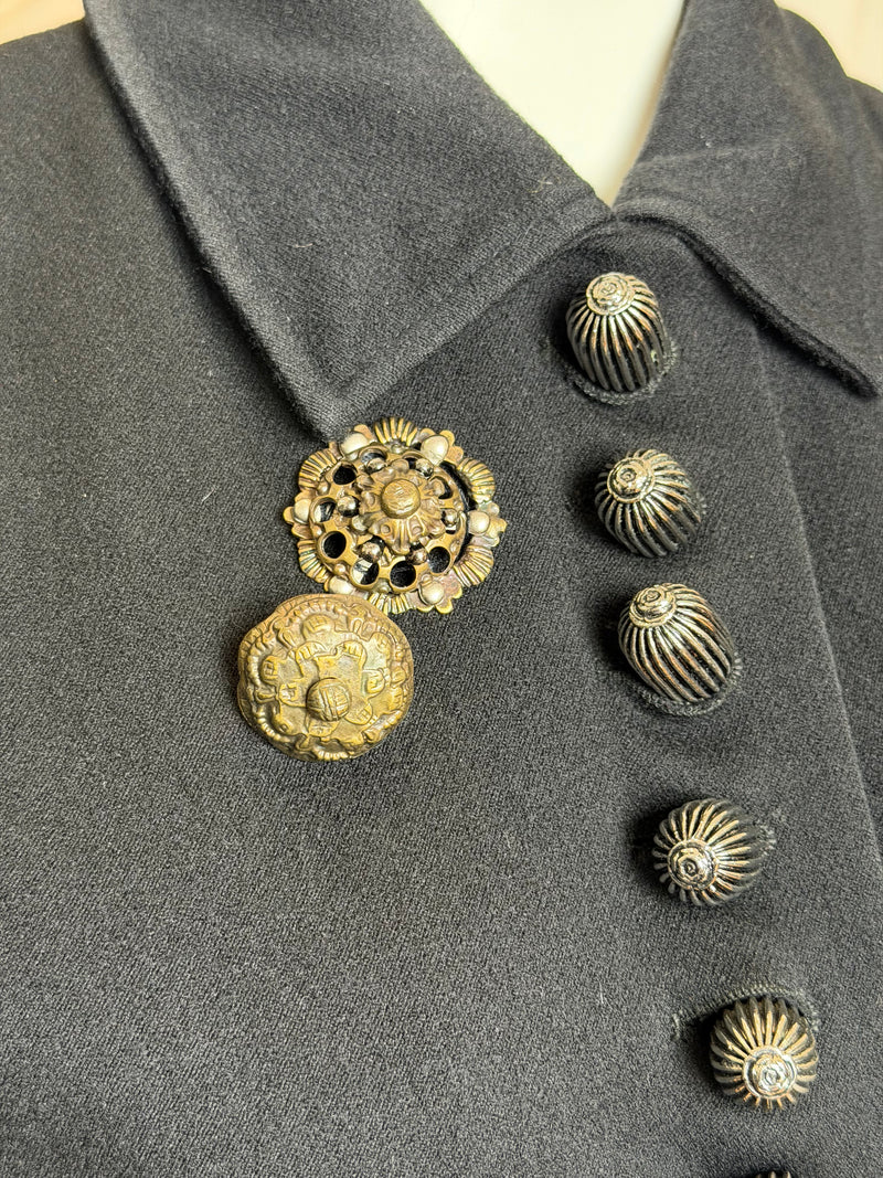 Charcoal melange wool vest by Helmut Lang, interior lining and signature hardware details