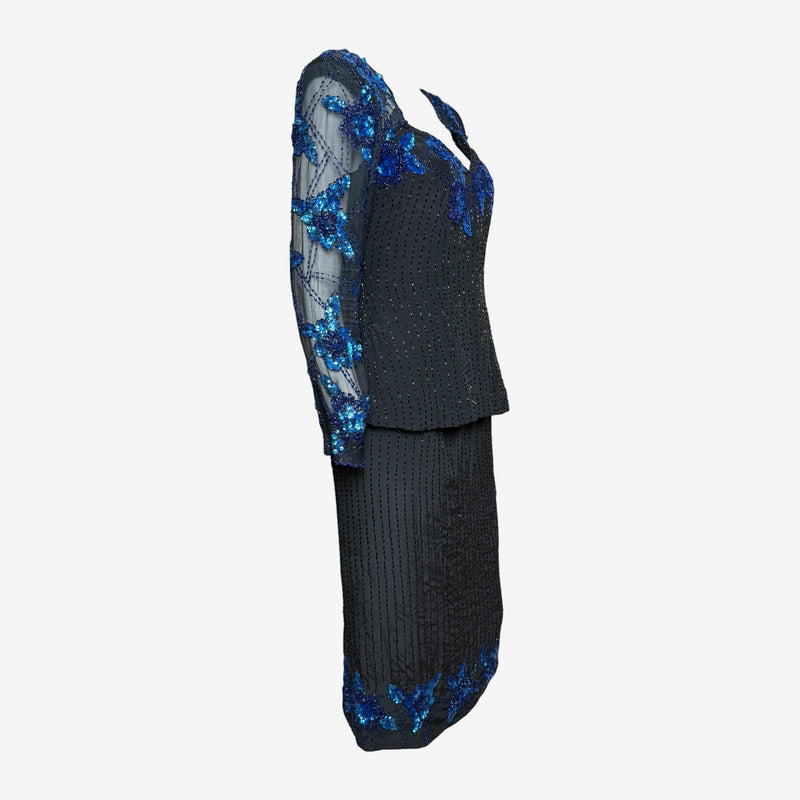 Navy sequined top detail displaying dimensional floral motifs and black bugle beads