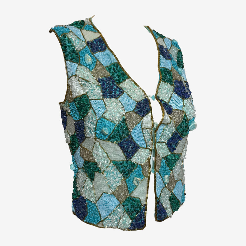 Detail of Blumarine beaded vest with gold thread embroidery and polished stone cabochons