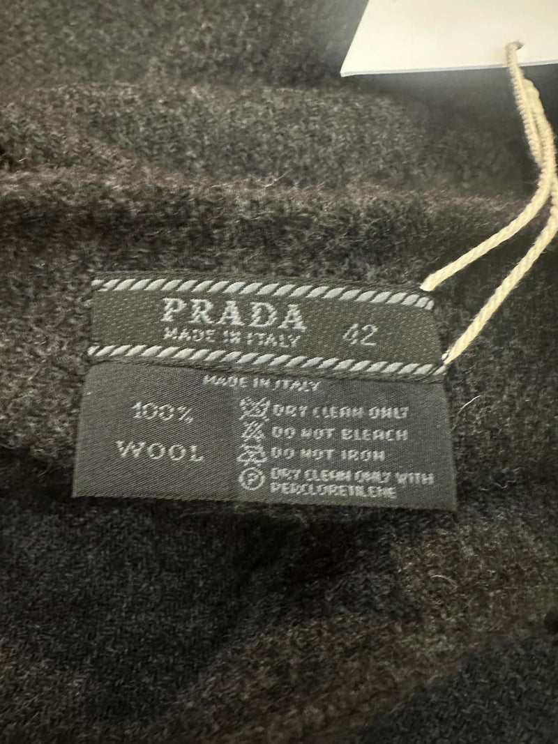 Charcoal grey wool pencil skirt by Prada, flat lay showing fitted hip line and knee-length hemline