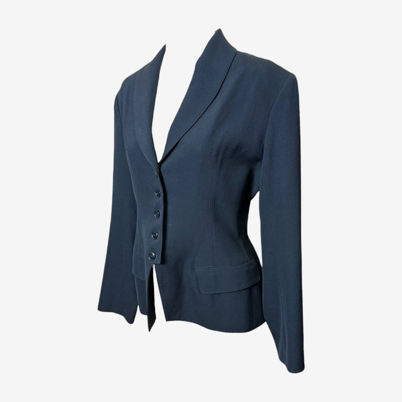 Alaïa shawl collar blazer rear view, showing clean tailoring and hip pocket
