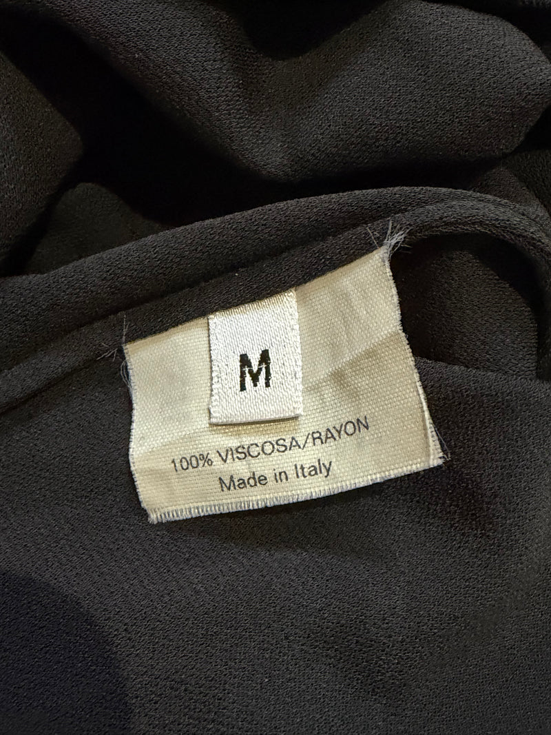 Black jersey top by Tom Ford for YSL, exaggerated bell sleeve cuff