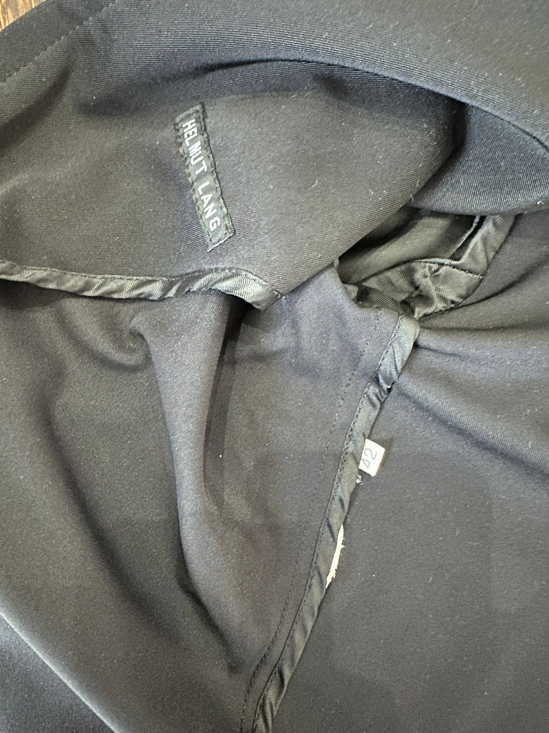 Interior detail of Helmut Lang blazer showing unlined construction and internal seaming