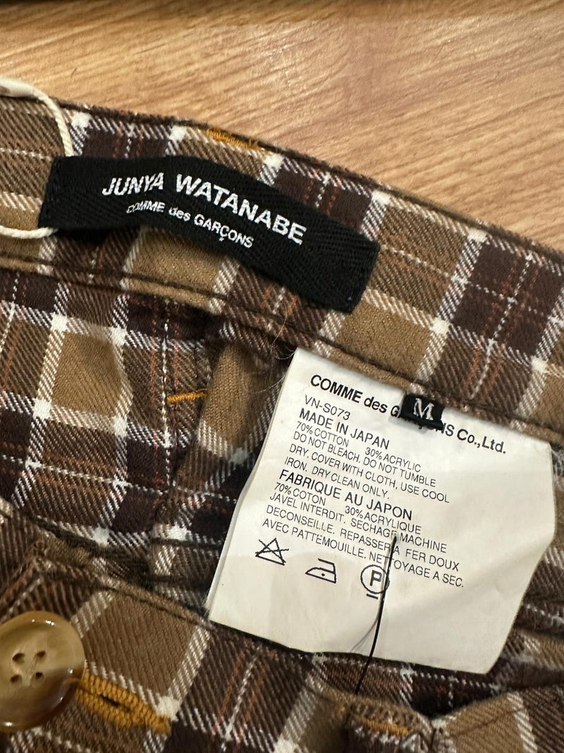 Brown and beige tartan wool wrap maxi skirt by Junya Watanabe, flat lay showing plaid pattern and uneven hemline