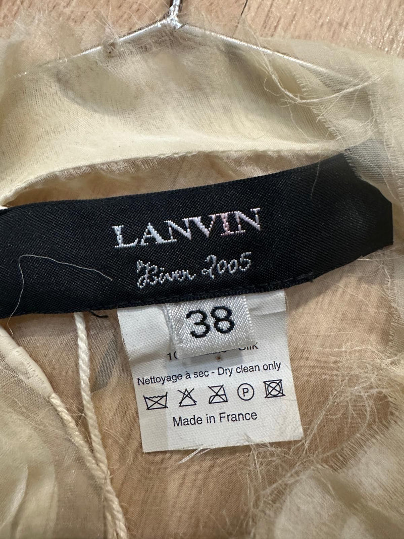 Ivory silk chiffon blouse by Lanvin, mother-of-pearl buttons and pussy bow styling