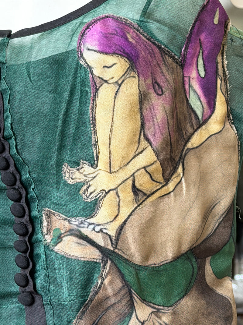 Emerald green silk organza dress by Prada, detail of James Jean watercolor fairy illustrations