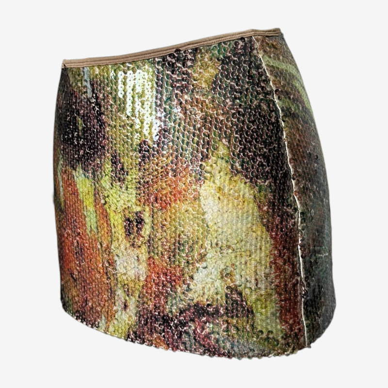 Sequined mini skirt by Plein Sud, side profile showing fitted silhouette and asymmetrical hem