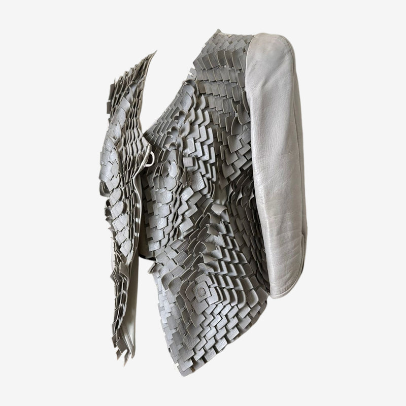 Giorgio Armani S/S 2013 jacket, side profile displaying woven leather body and tailored grey sleeve