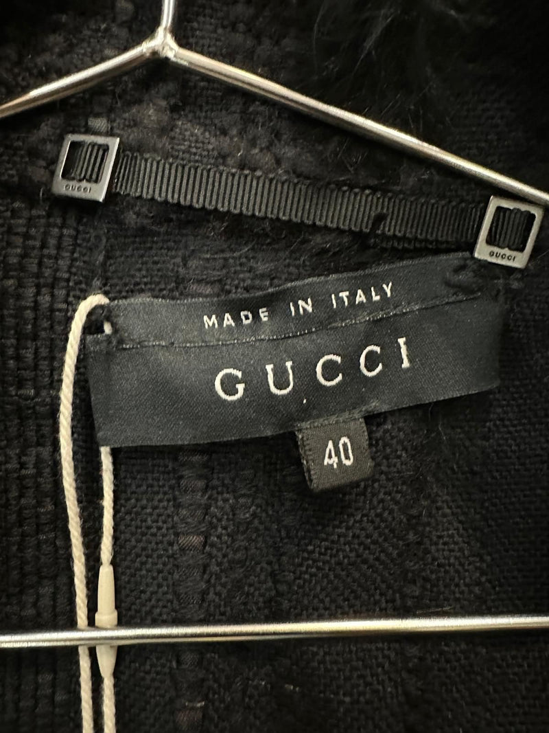 Charcoal grey cotton knit coat by Gucci Tom Ford, full length showing unlined construction and raw edges