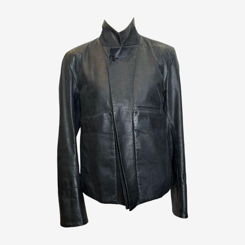 Black leather jacket by Ann Demeulemeester, asymmetrical front closure with single button fastening