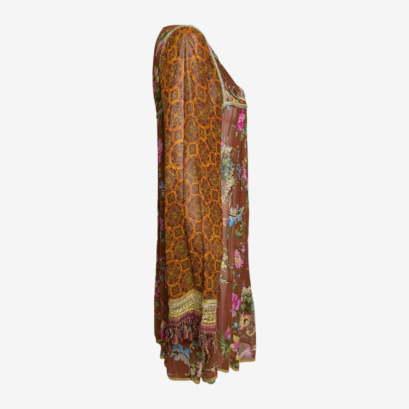 Back view of mixed print silk dress by Dolce & Gabbana with invisible zipper closure