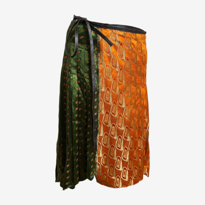 Patchwork brocade wrap skirt by Jean Paul Gaultier, irregular hemline detail across contrasting fabric panels