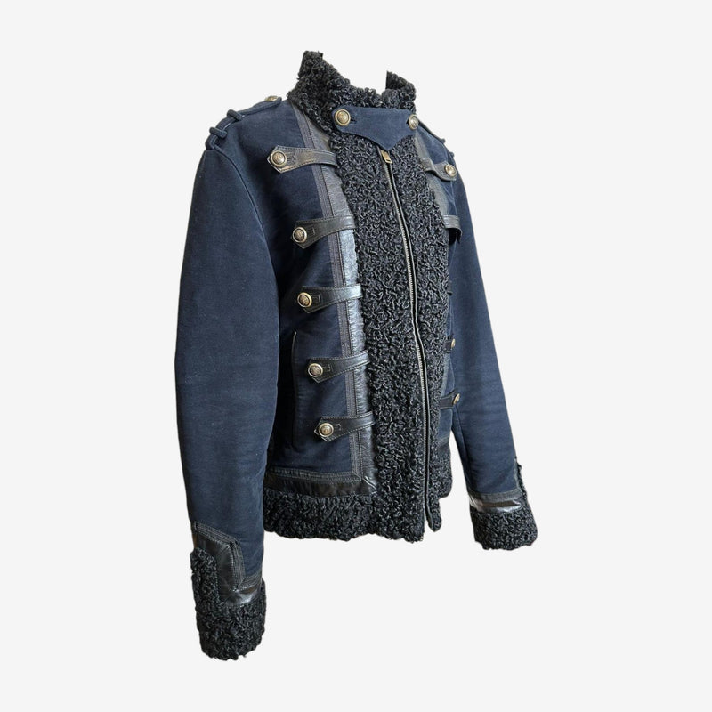 Navy military jacket by Gucci, side profile showing structured regimental silhouette