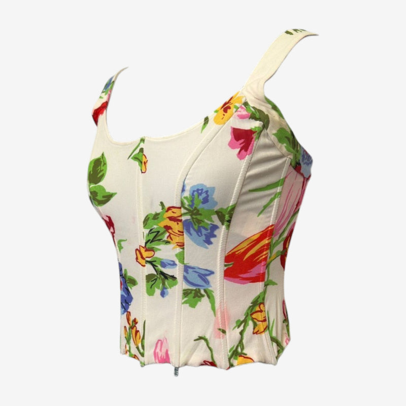 Detailed view of internal boning structure on Dolce & Gabbana corset top with cream silk base
