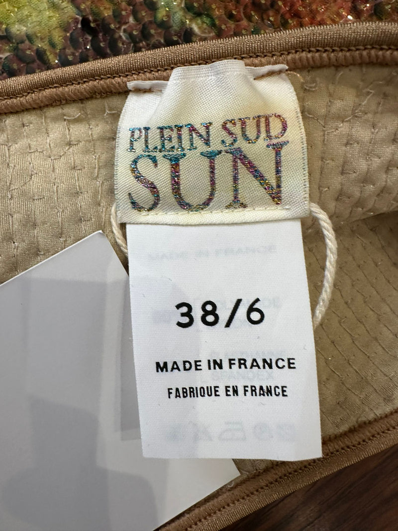 Iridescent sequined mini skirt by Plein Sud, detail of mesh lining and elastic waistband