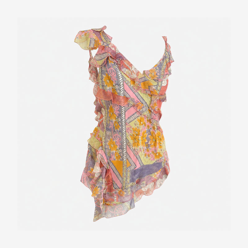 Back view of printed chiffon top showing layered construction and raw edge finishing