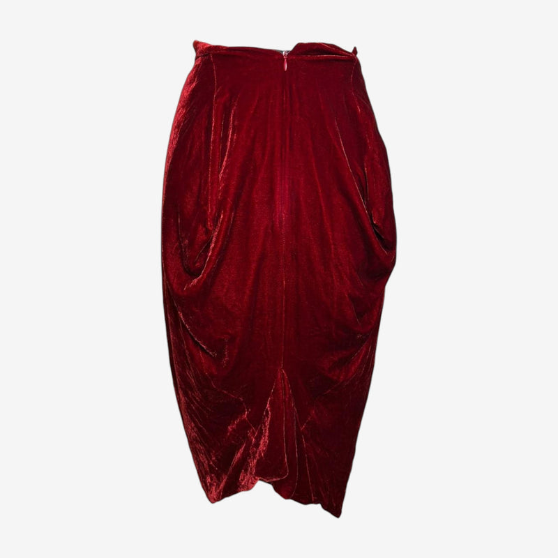Red velvet draped skirt by Vivienne Westwood, side view showing asymmetrical gathering