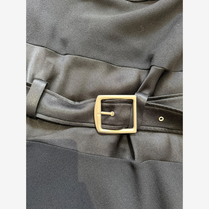 Black wool crepe mini dress by John Galliano, front view showing belt with brushed silver buckle