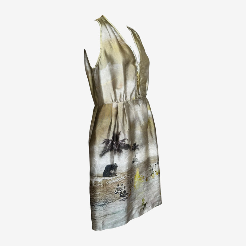 Back view of cream silk halter dress showing invisible zip closure and tropical print