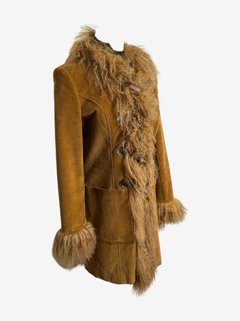 Camel shearling coat by Dolce & Gabbana, back view with fur-trimmed hemline and relaxed silhouette