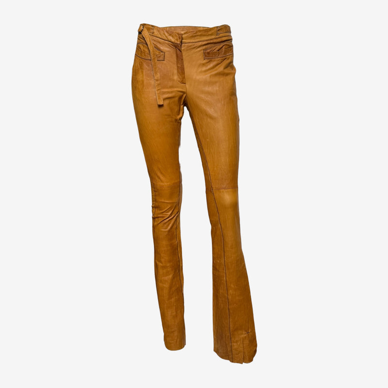 Cognac leather flare pants by Roberto Cavalli, low-rise silhouette with embroidered tattoo detail on back pocket