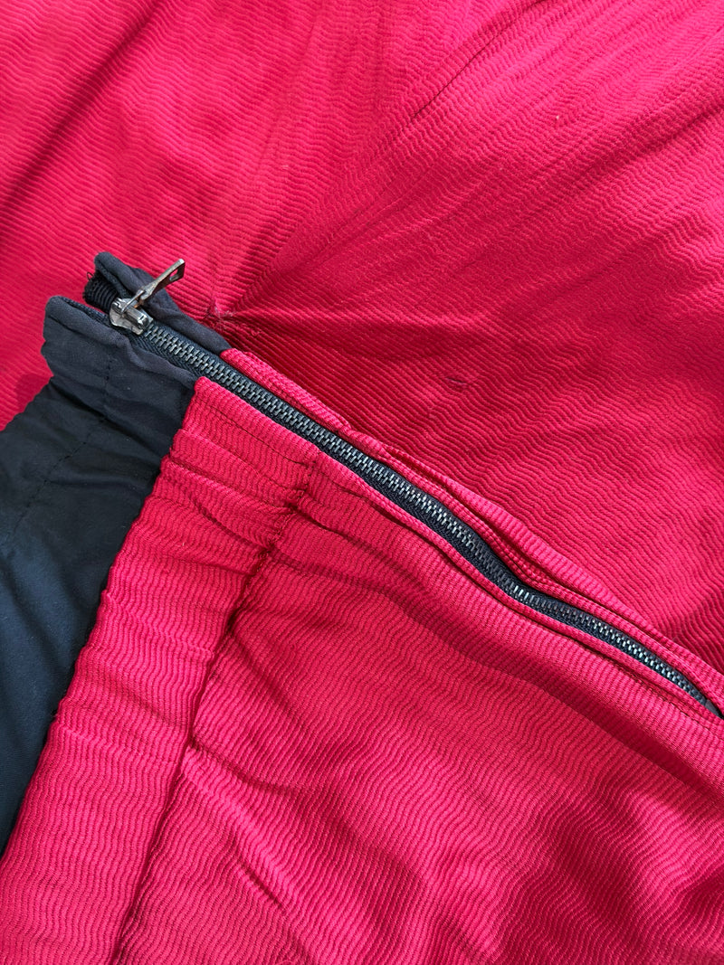 Red crinkled midi skirt by Prada, back view with adjustable waistband tie