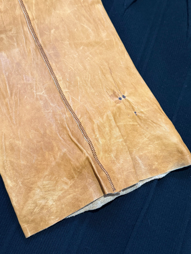 Cognac lambskin flare pants by Roberto Cavalli, leg opening and hem detail