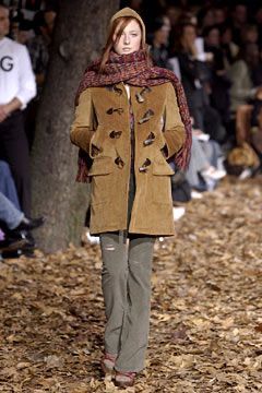 Camel shearling coat by Dolce & Gabbana, side profile showing dropped shoulders and three-quarter length