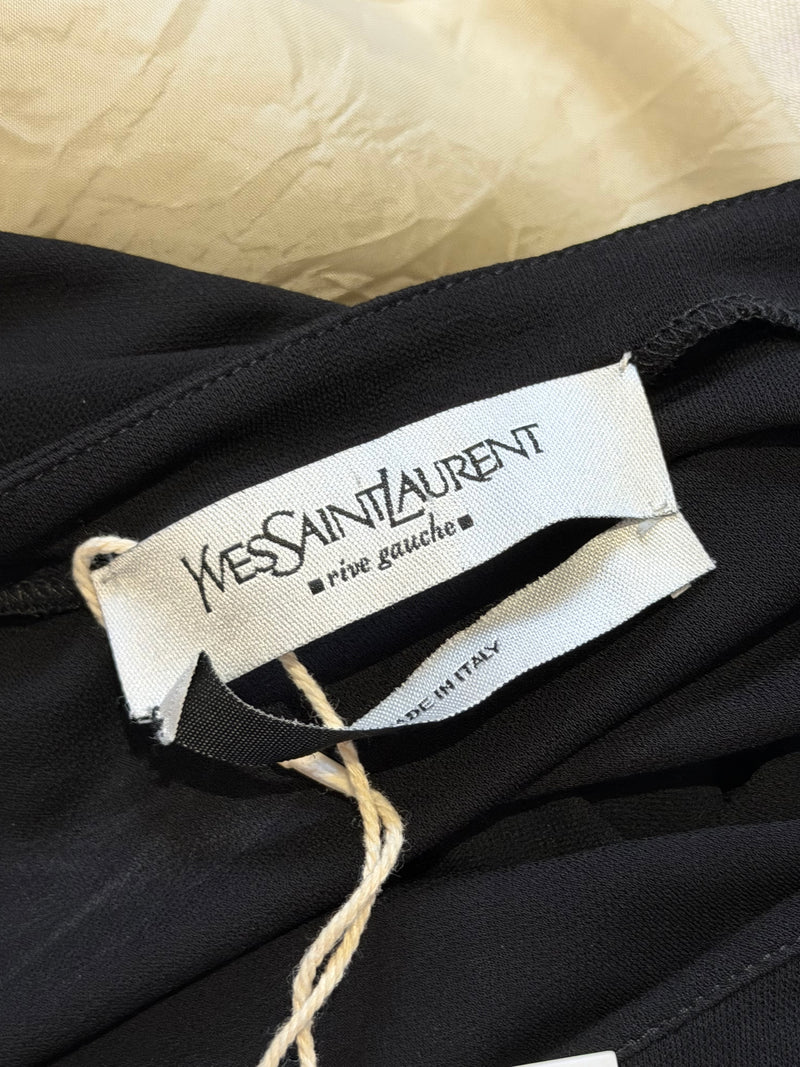 Black jersey bell sleeve top, interior construction detail