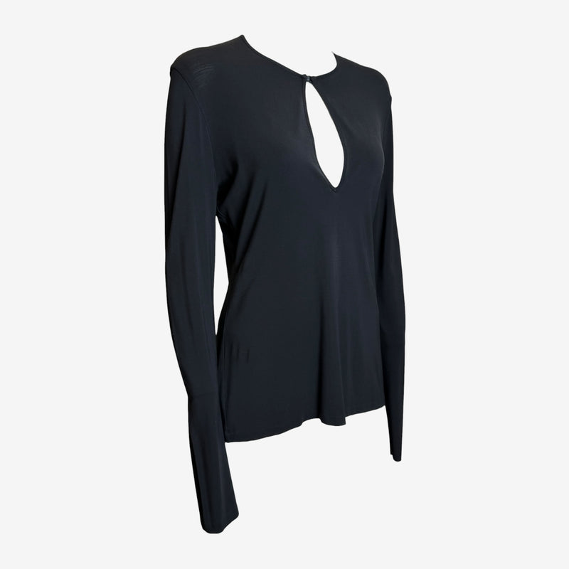 Black jersey keyhole top by Gucci, detail of teardrop cutout at chest