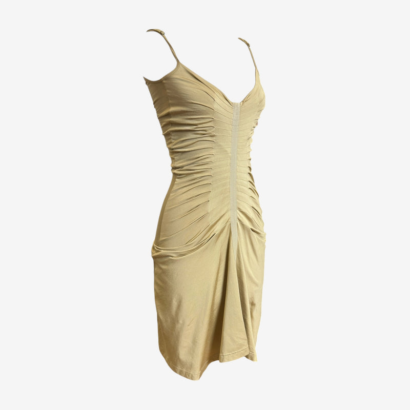 Plein Sud beige drape dress, side profile highlighting hip draping and fitted silhouette