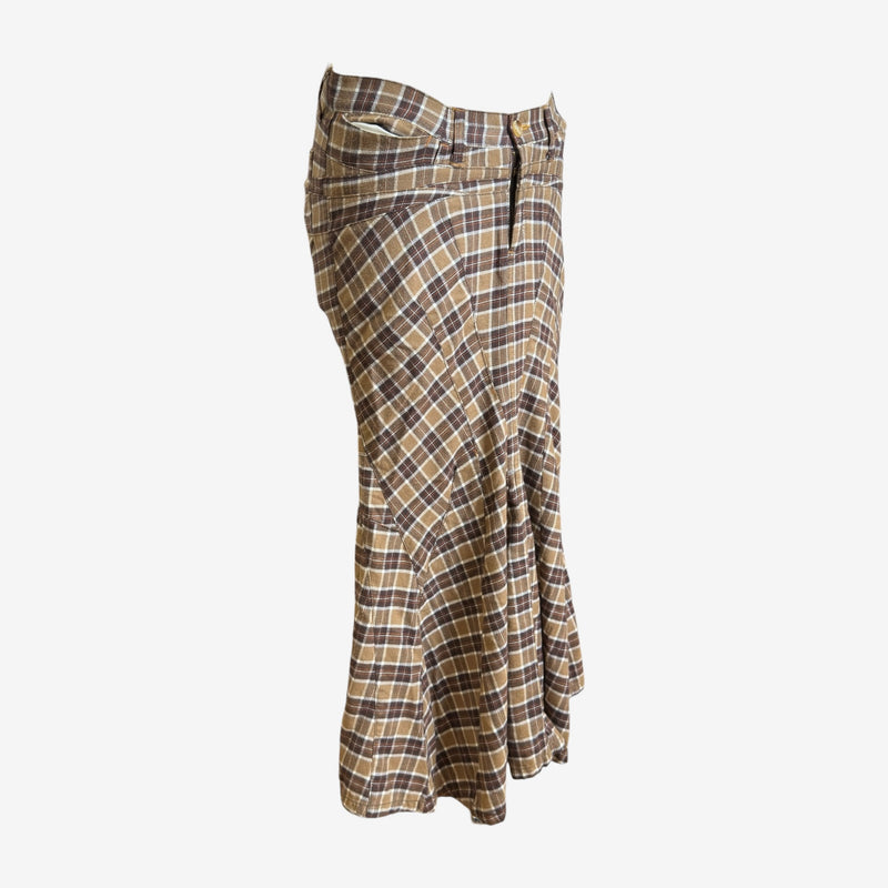 Brown and beige tartan wool wrap maxi skirt by Junya Watanabe, side profile displaying asymmetric hem and fluid drape
