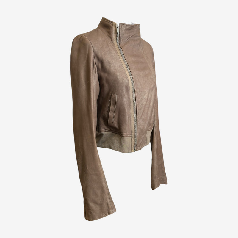 Rick Owens taupe leather bomber jacket, side profile showing fitted silhouette and sleeve detail