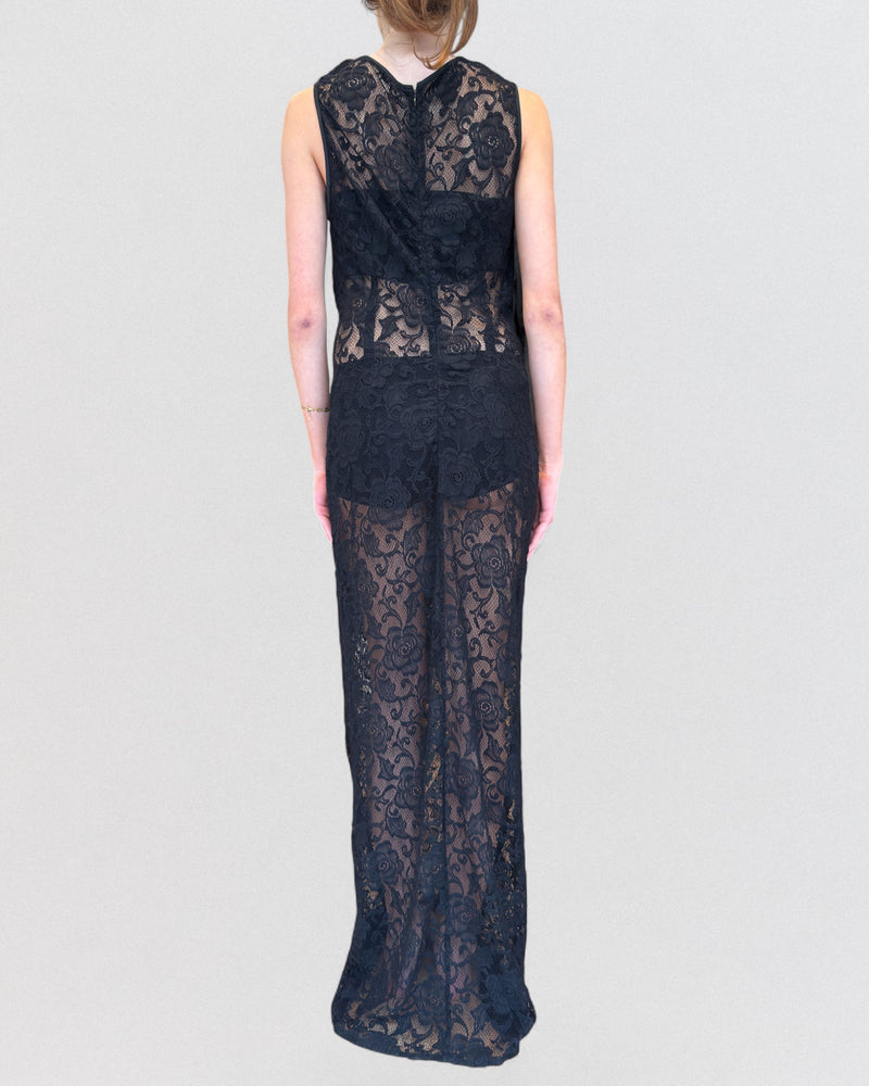 Black lace gown by Dolce & Gabbana, floor-length silhouette with sheer lace drape