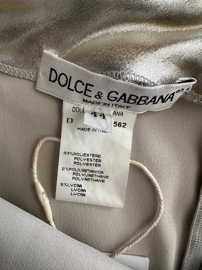 Silver metallic maxi skirt by Dolce & Gabbana, full length detail of lamé fabric and hem