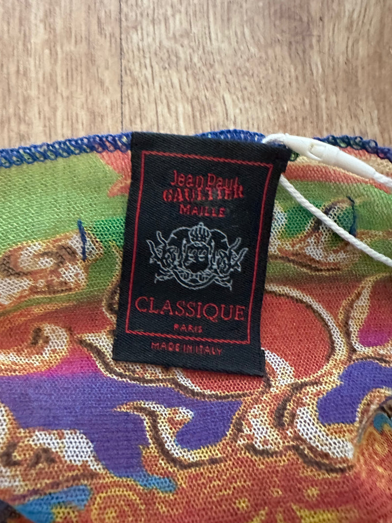 Flat lay of multicolored stretch mesh top by Jean Paul Gaultier, S/S 1997 Shiva deity collection