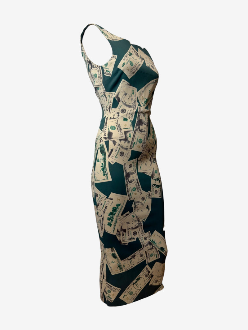 Side view of deep green dollar print jersey dress by Dolce & Gabbana, midi length silhouette