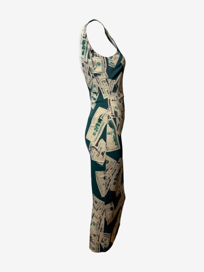Detail of deep V-neckline on Dolce & Gabbana dollar print jersey dress