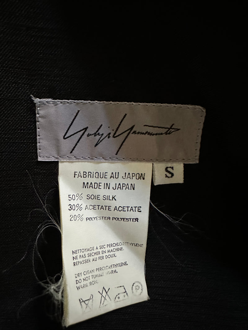 Charcoal grey linen wrap coat by Yohji Yamamoto, flat lay showing oversized silhouette