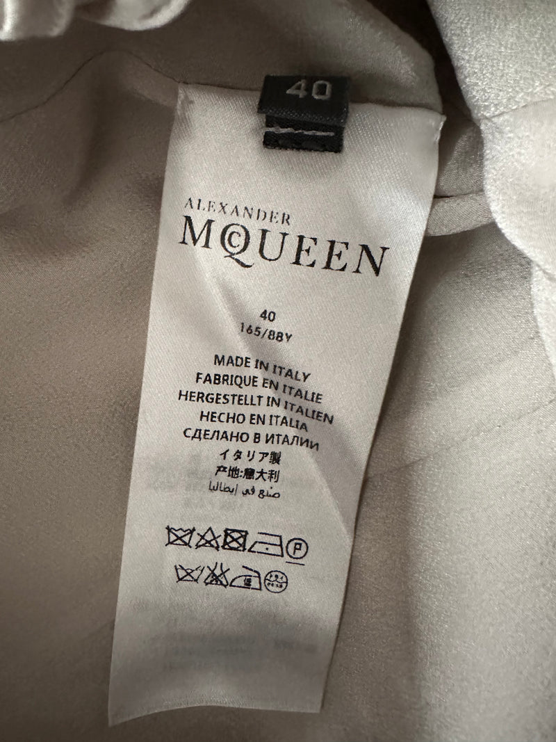 White silk wrap gown by Alexander McQueen, full length flat lay