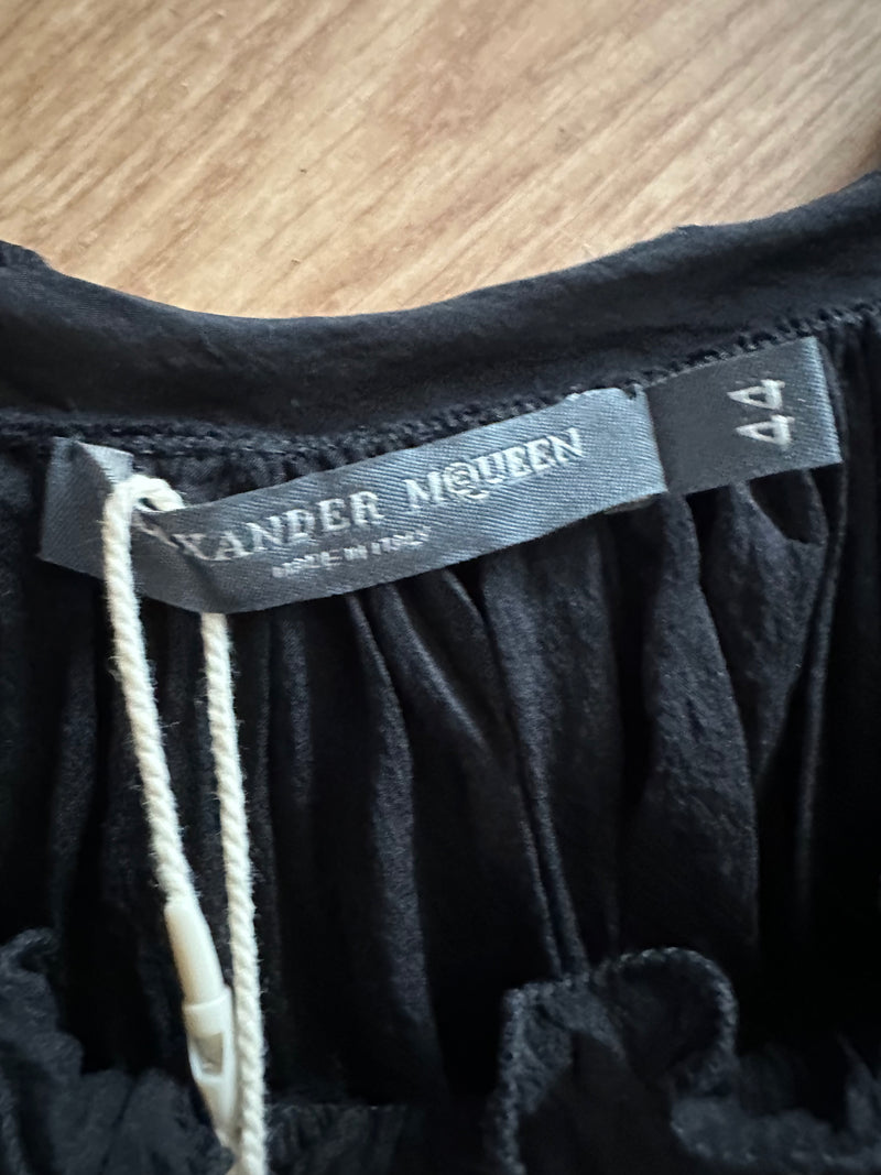 Black silk chiffon blouse by Alexander McQueen, back view showing French seam construction and flowing silhouette
