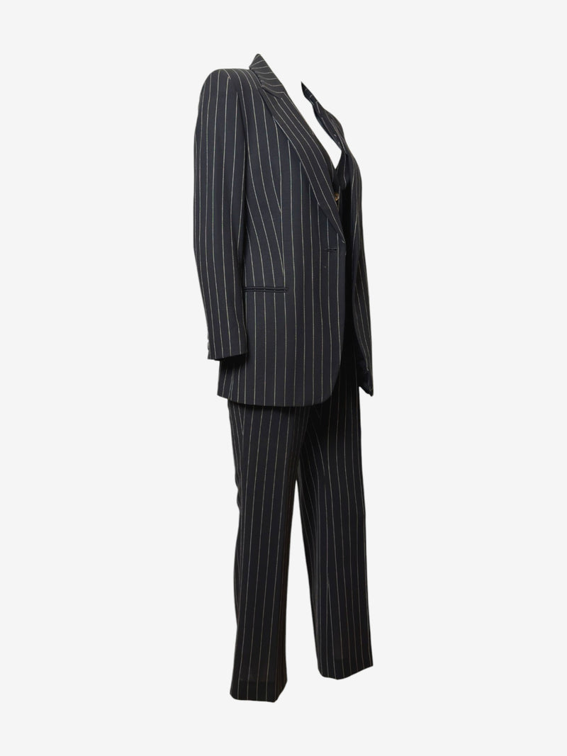 Navy pinstripe wool jacket by Gucci, back view showing fitted tailoring