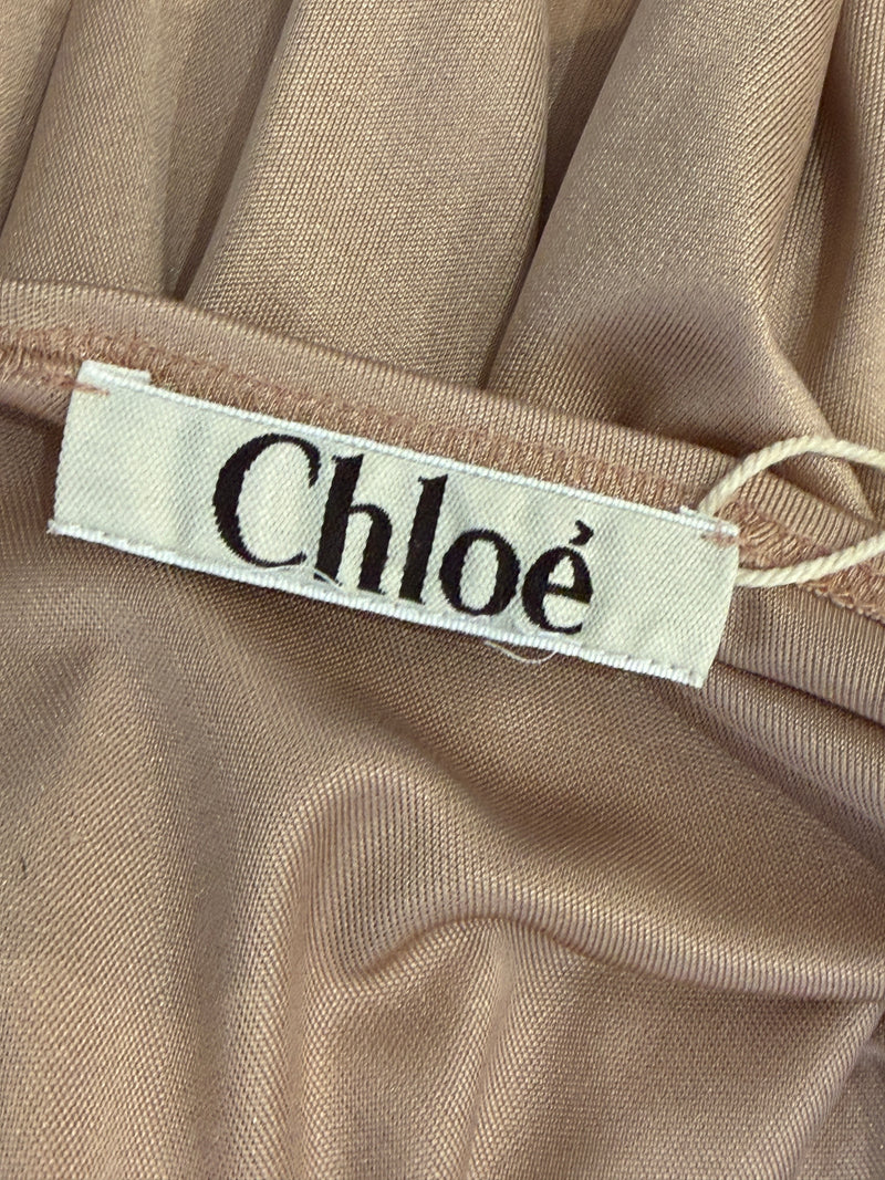 Interior seam detail showing Chloé woven label on silk jersey wrap dress