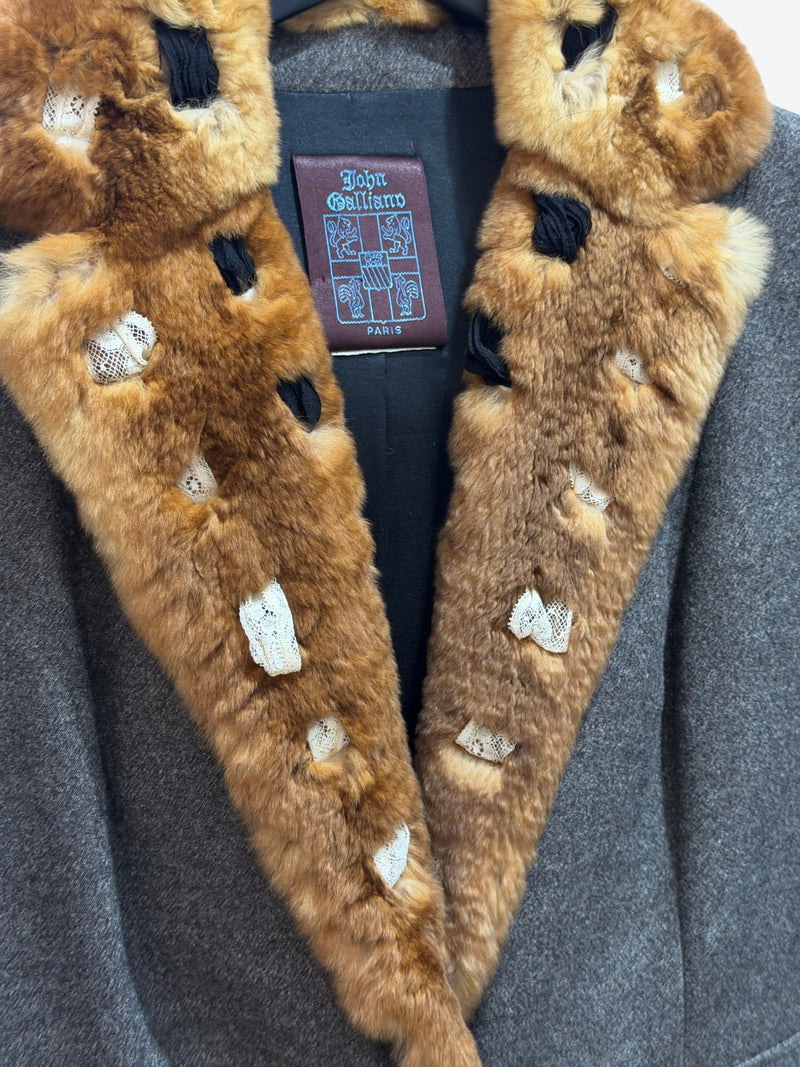 Close-up of embellished fur cuff detail on John Galliano F/W 2001 blazer sleeve