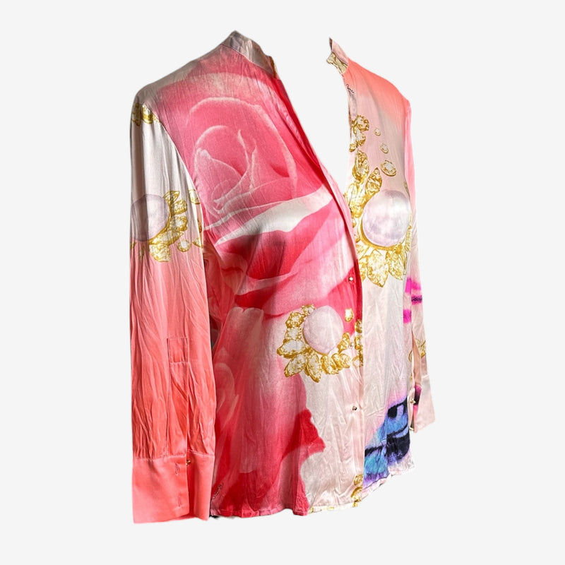 Roberto Cavalli blouse detail, multi-layered graphic composition with photographic eyes, baroque medallions, and abstract color washes