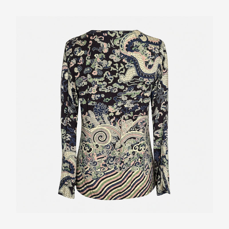 Front detail of Yves Saint Laurent silk blouse, scoop neckline and chinoiserie dragon motifs