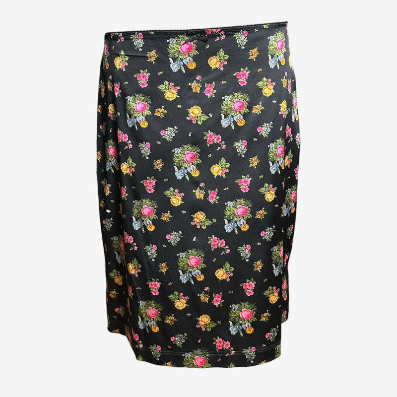 Black silk pencil skirt by Dolce & Gabbana with allover floral print in pink, yellow, and blue roses