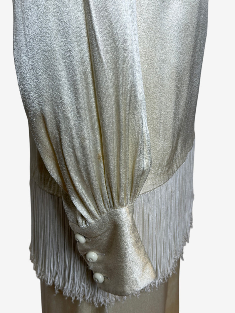 Silver metallic satin evening ensemble by Yves Saint Laurent, full-length view with coordinating blouse and trousers